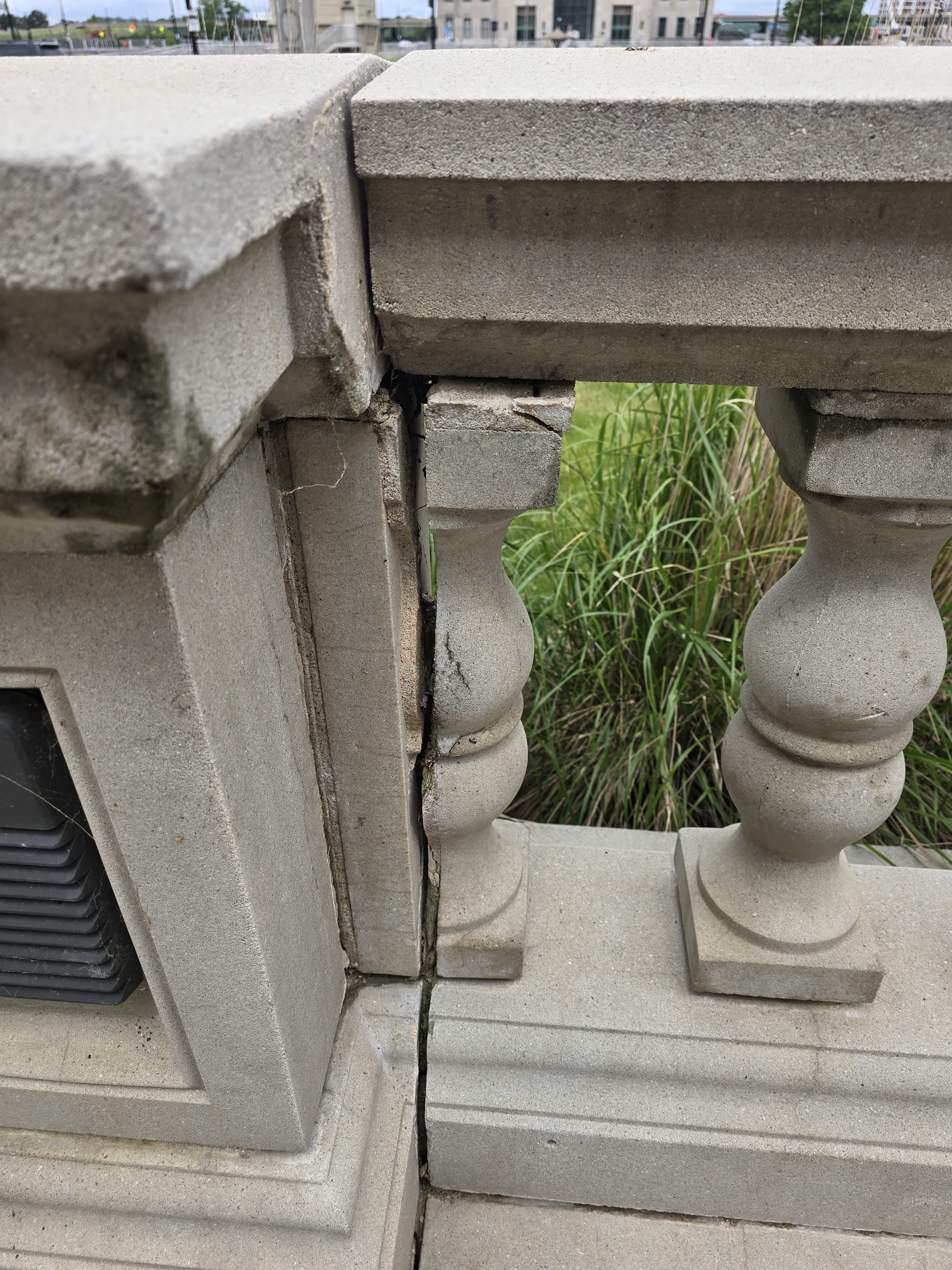 Deteriorated stone and failed sealant joints at Linn County Courthouse plaza
