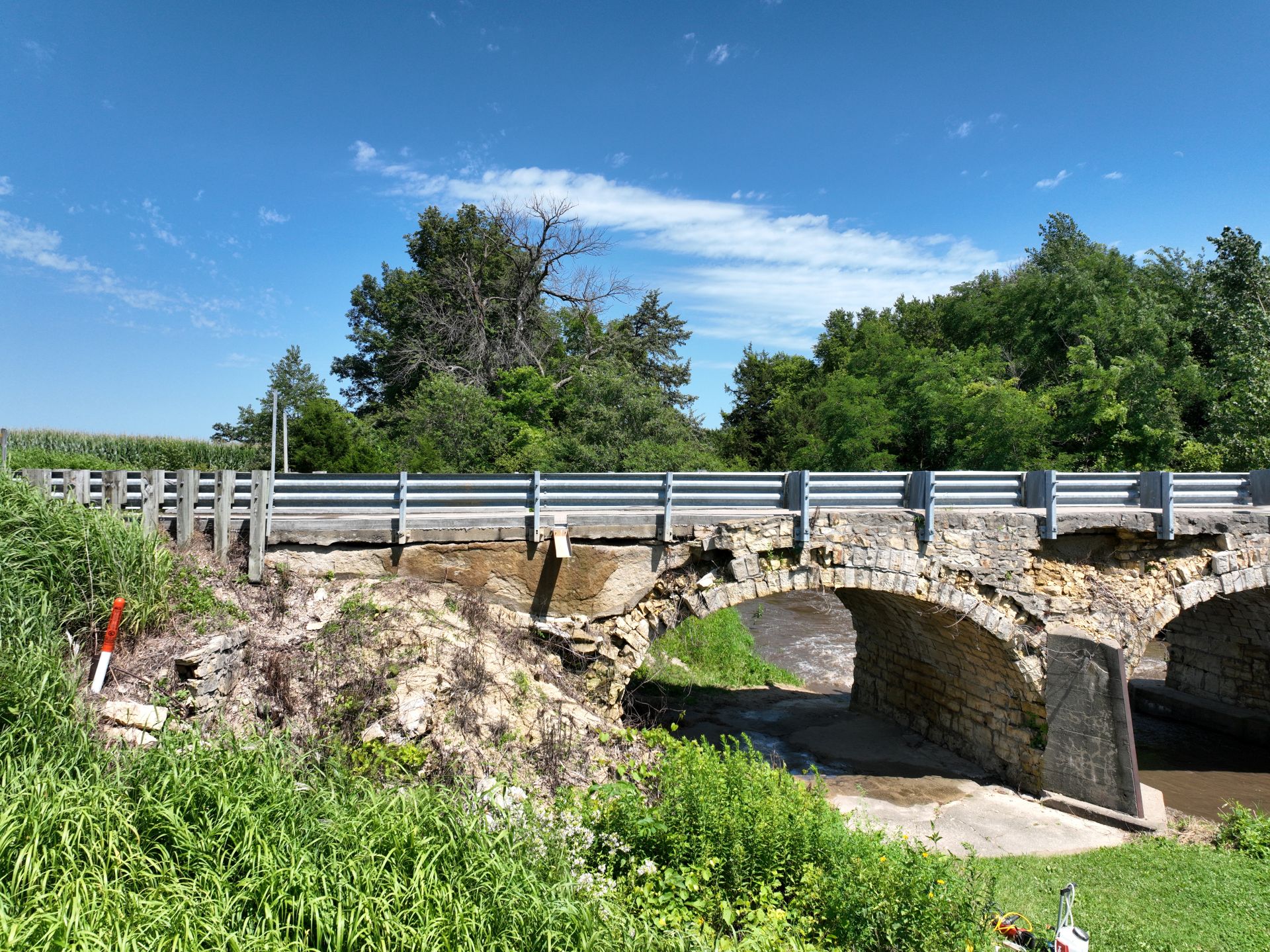 Ely's Stone Bridge, an 1893 three-arch limestone bridge over Deer Creek outside Monticello in Jones County, Iowa.