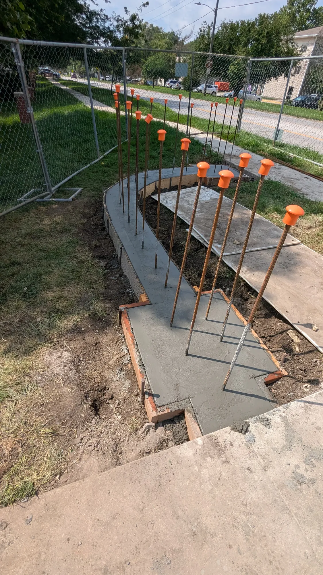 Concrete backup wall formed and poured behind new stone veneer at Fort Des Moines monument