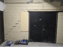 New gray block toothed into a painted block wall at Brady Street Stadium in Davenport, Iowa
