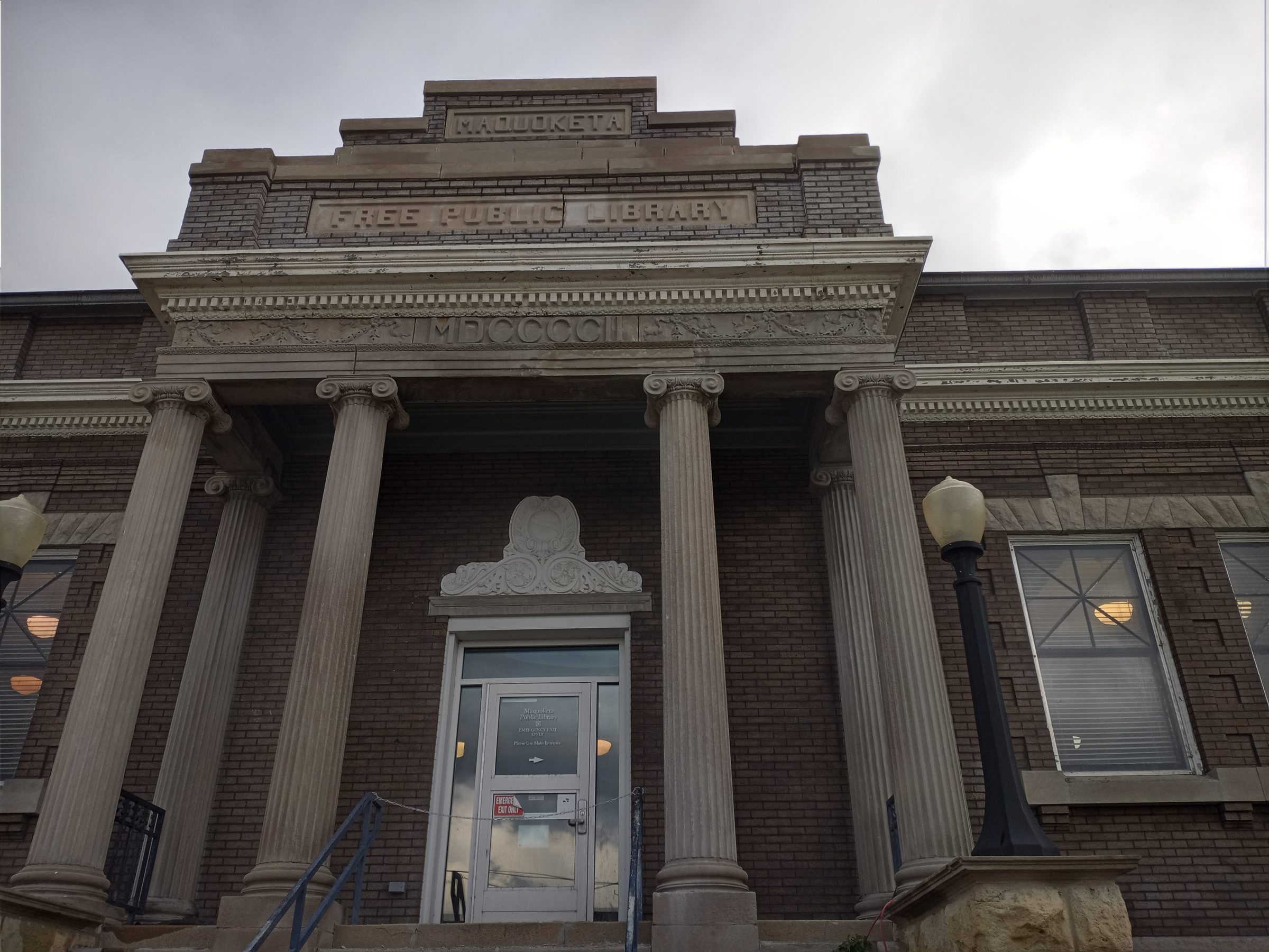 Grand Ionic-column entry of the Maquoketa Public Library in Maquoketa, Iowa, after repointing by TNT Tuckpointing
