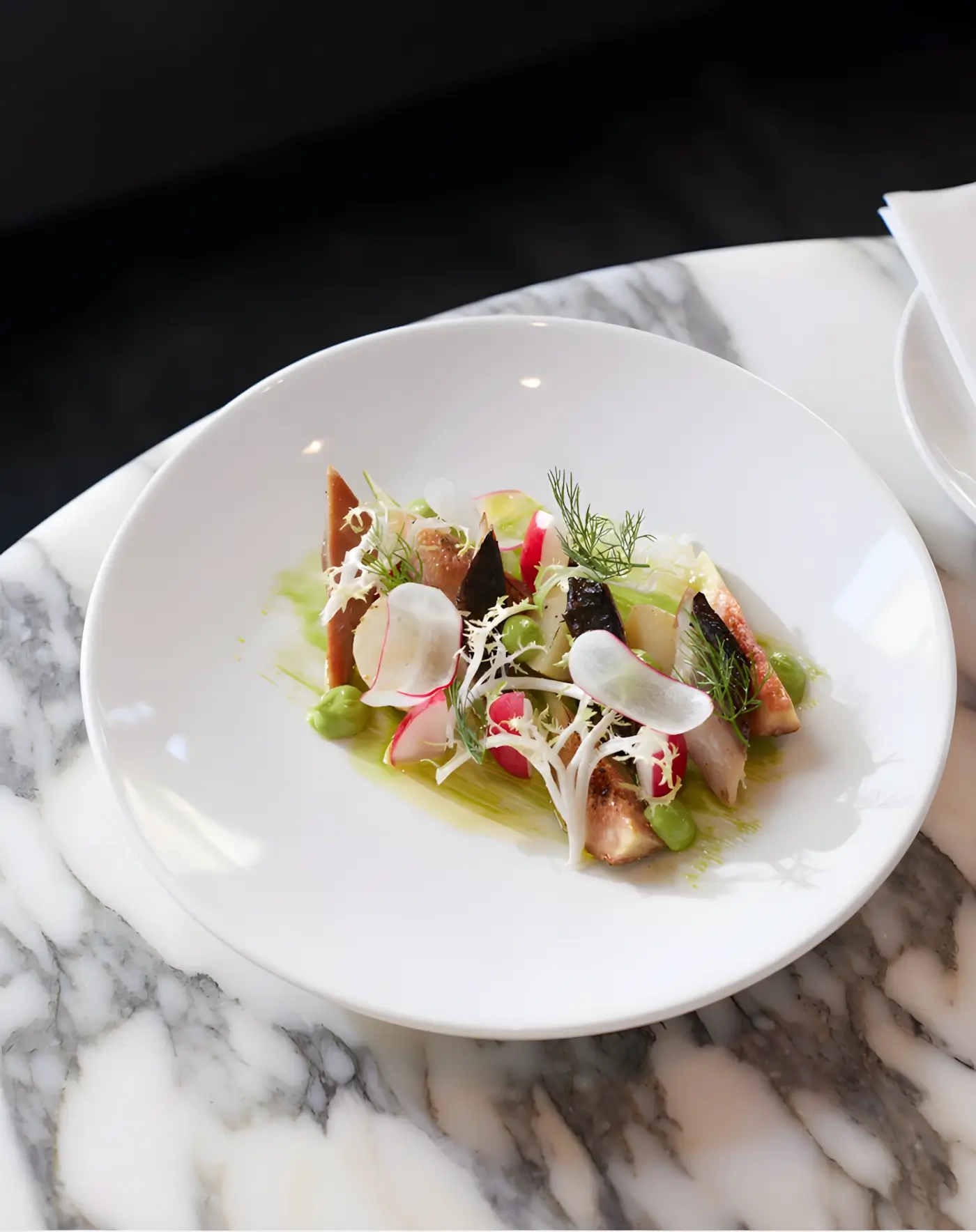 Fish dish with seasonal greens at Sam's Waterside, Brentford