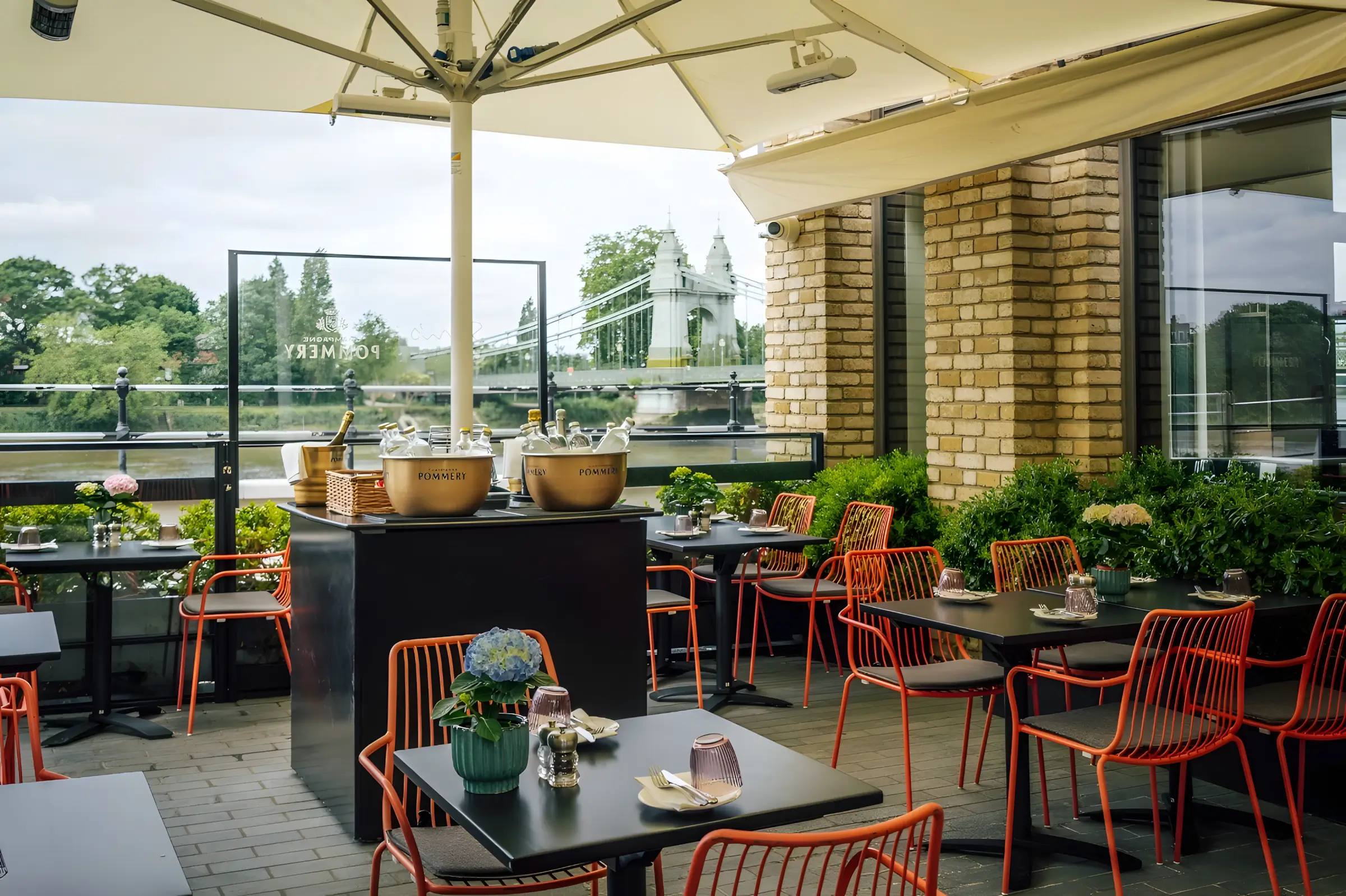 Sam’s Riverside terrace in Hammersmith overlooking Hammersmith Bridge