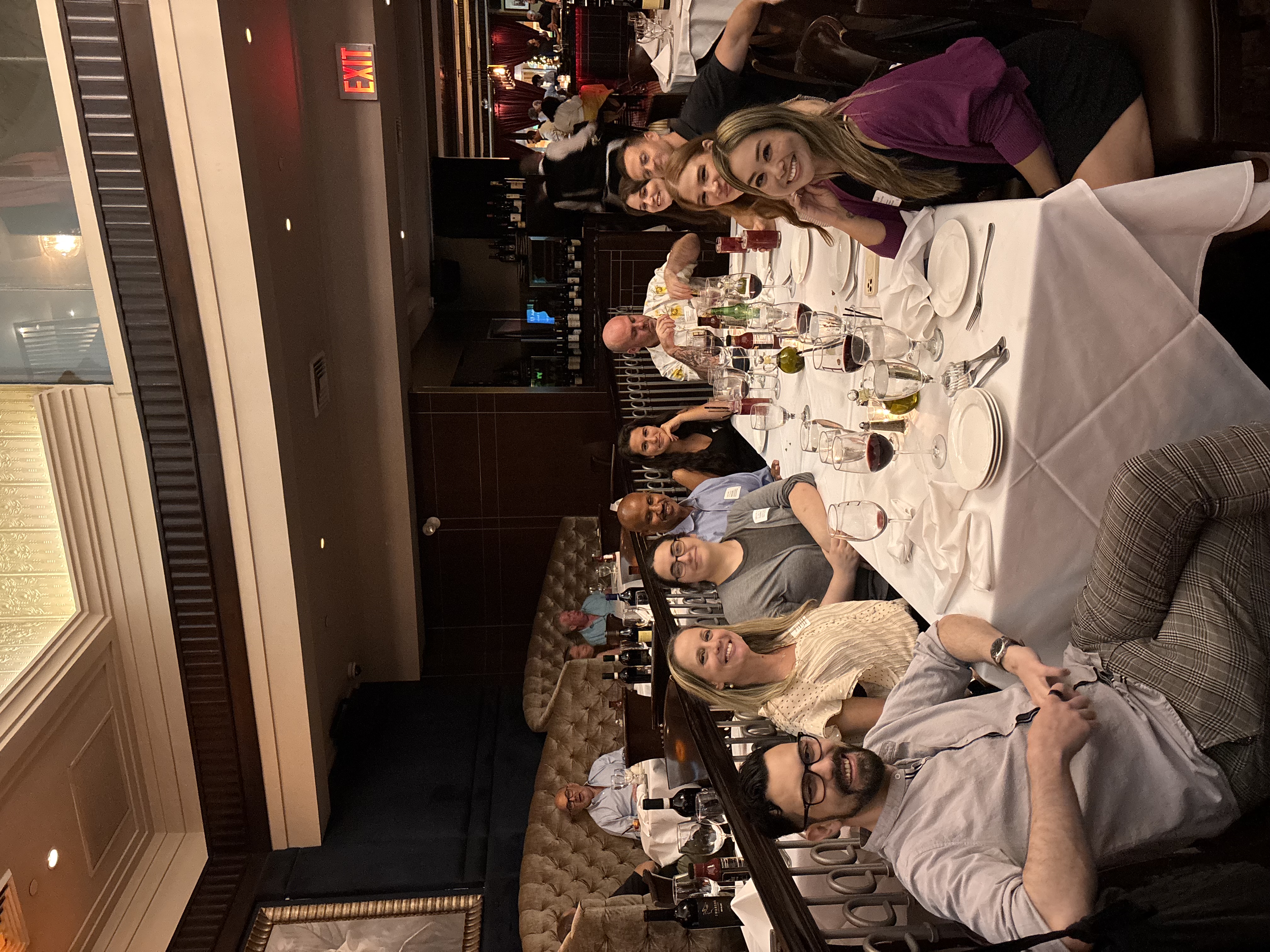 people at a dinner table in NYC