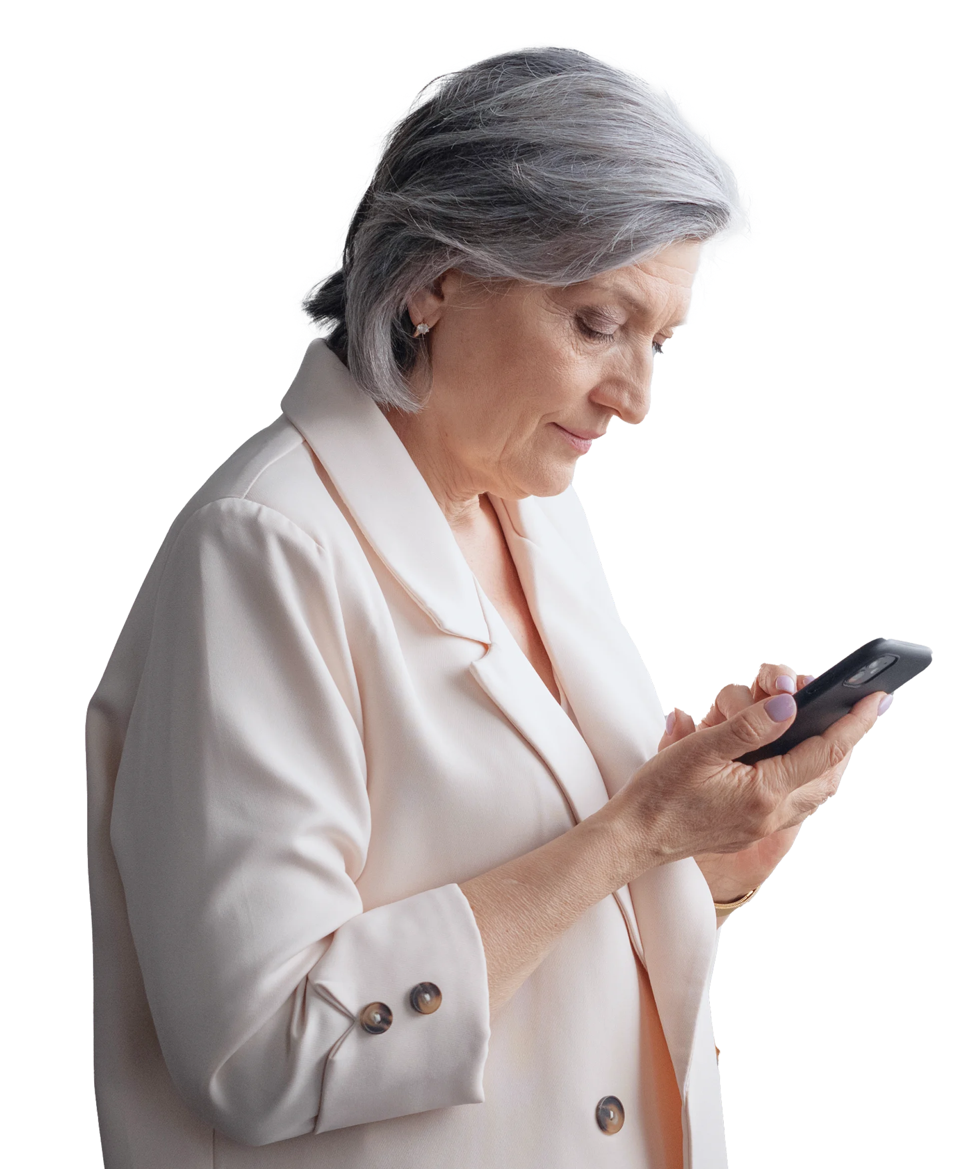 An older woman looking at her cell phone.