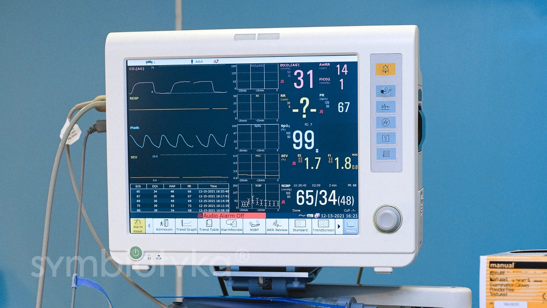 A medical machine with a monitor on top of it.