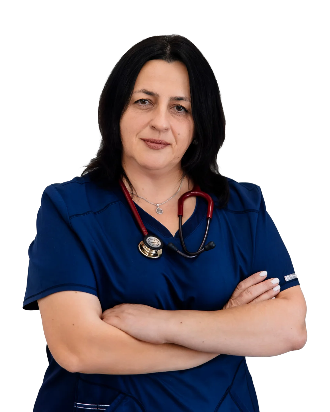A woman with a stethoscope standing with her arms crossed.