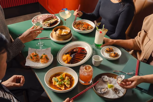 Large Cantonese-inspired dinner spread