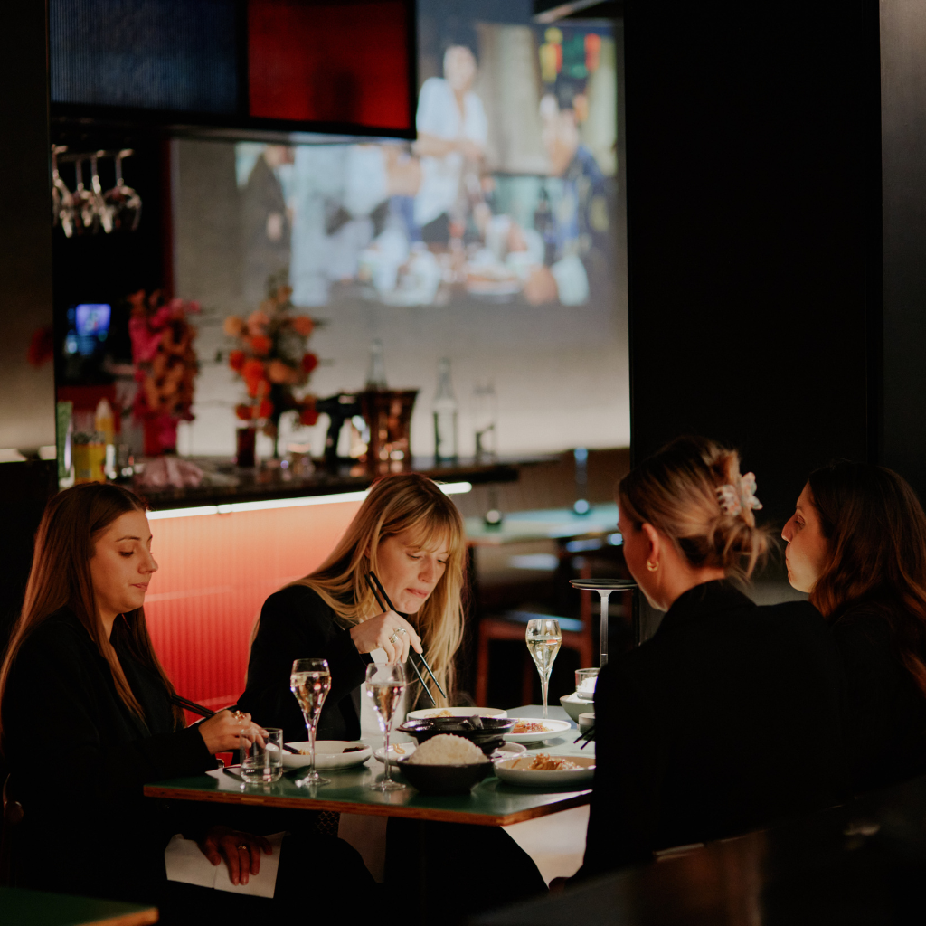 girls enjoying dinner celebrating birthday 