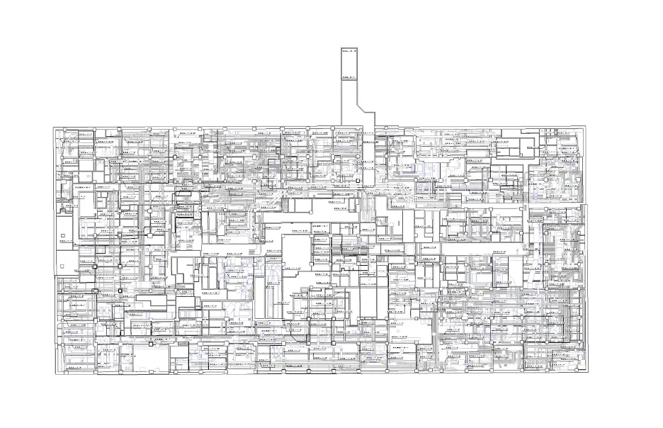 Architectural floor plan showing a complex layout of rooms, hallways, and structural elements.