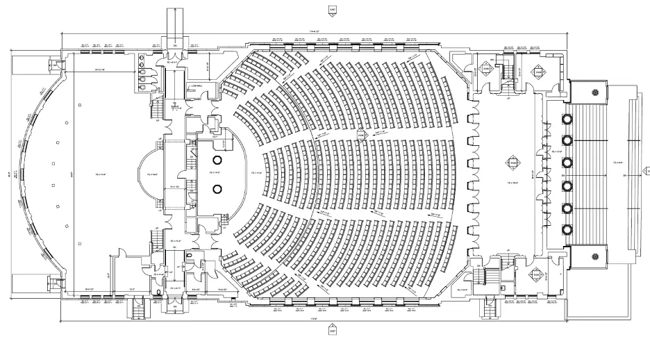 A detailed architectural floor plan of a large auditorium. The layout includes a semi-circular seating arrangement with multiple rows of seats facing a stage area.