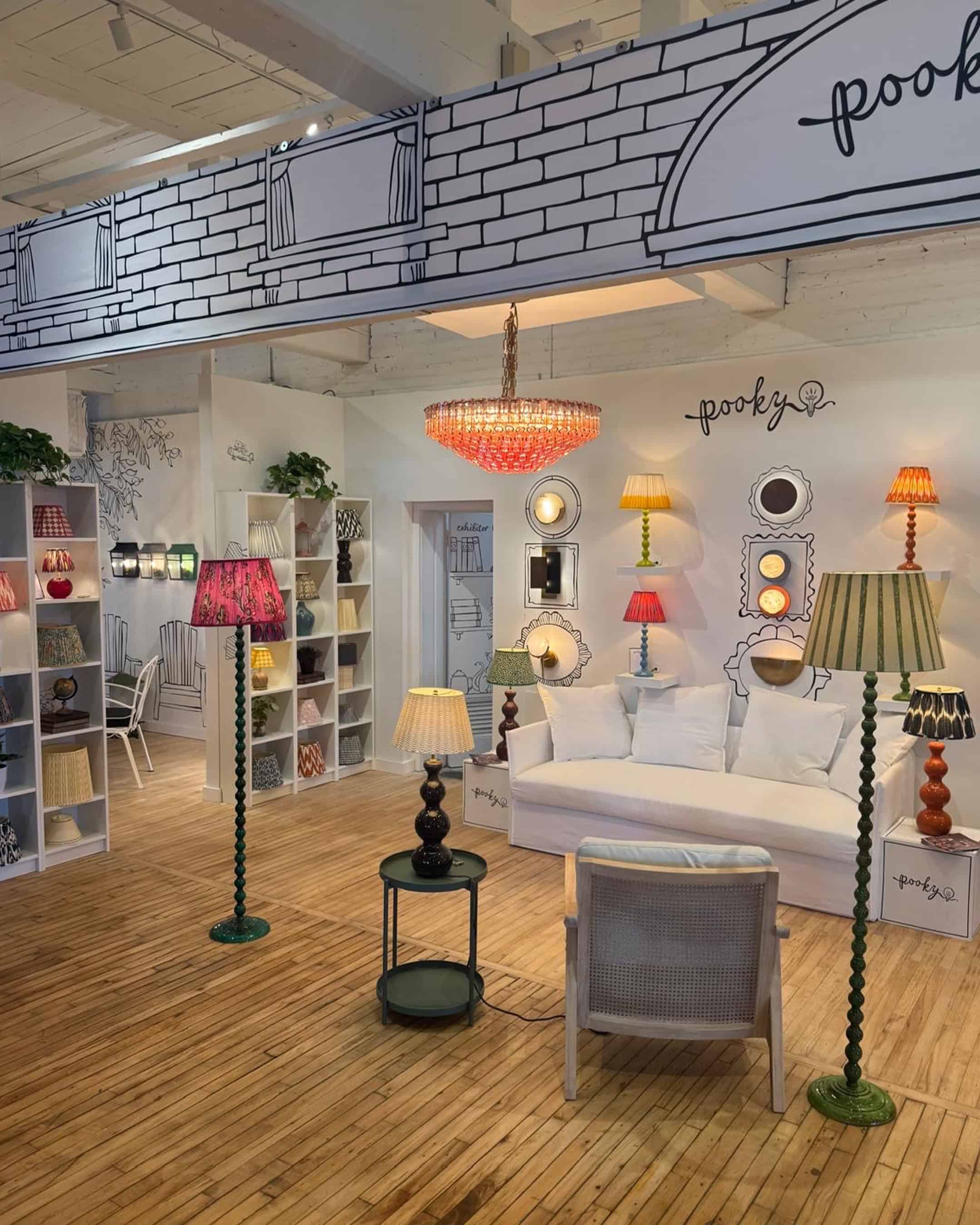 Illustration-led showroom and display design for Pooky lighting, showcasing a distinctive, energetic brand experience.