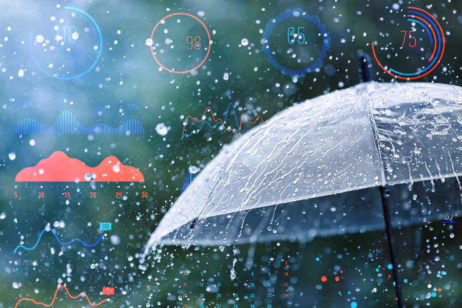 A clear umbrella surrounded by raindrops with weather data superimposed over it.
