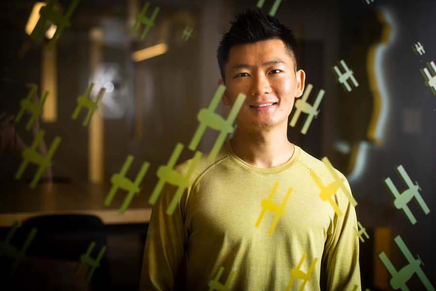 an image of Heng “Hank” Yang wearing a yellow shirt