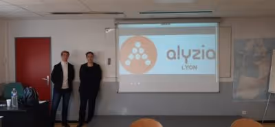 Team of Alyzia presenting to the students.