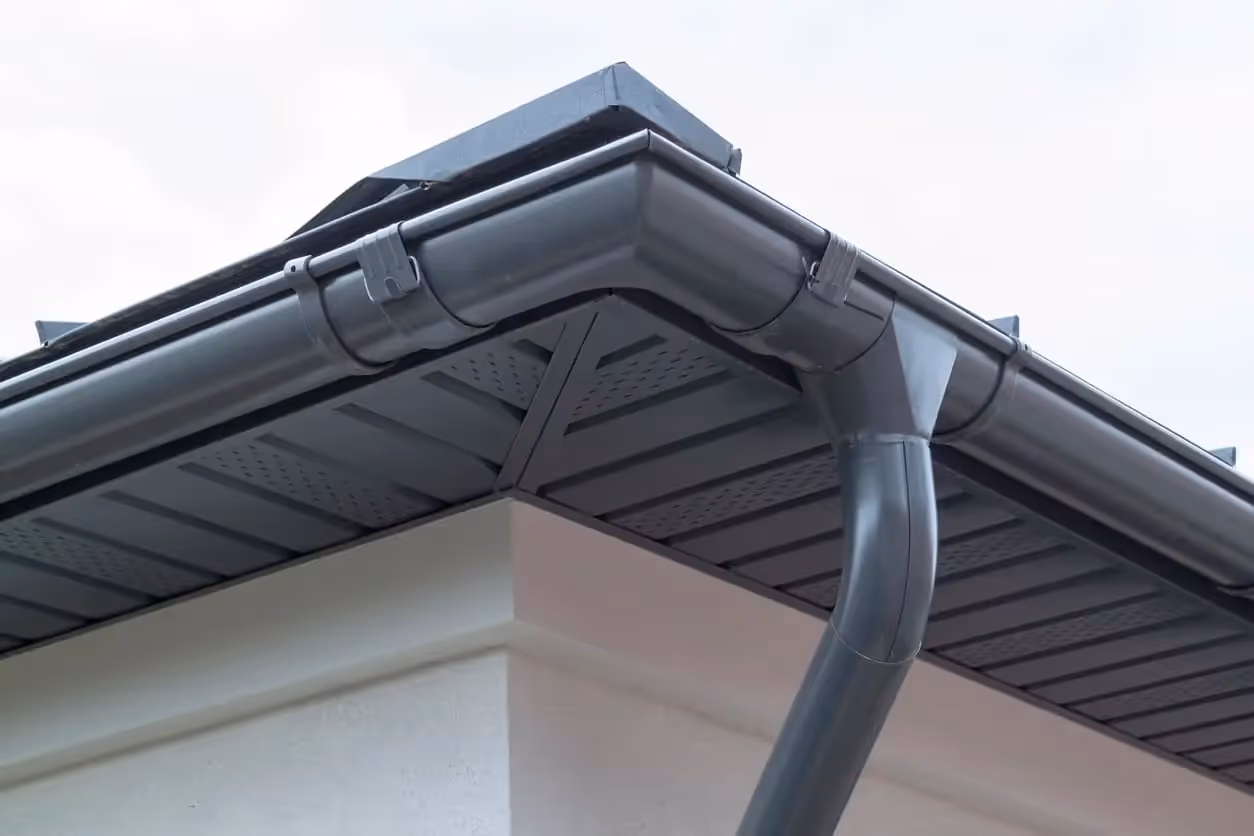 Corner of House Metallic Gutter Installation in Metro Chicago