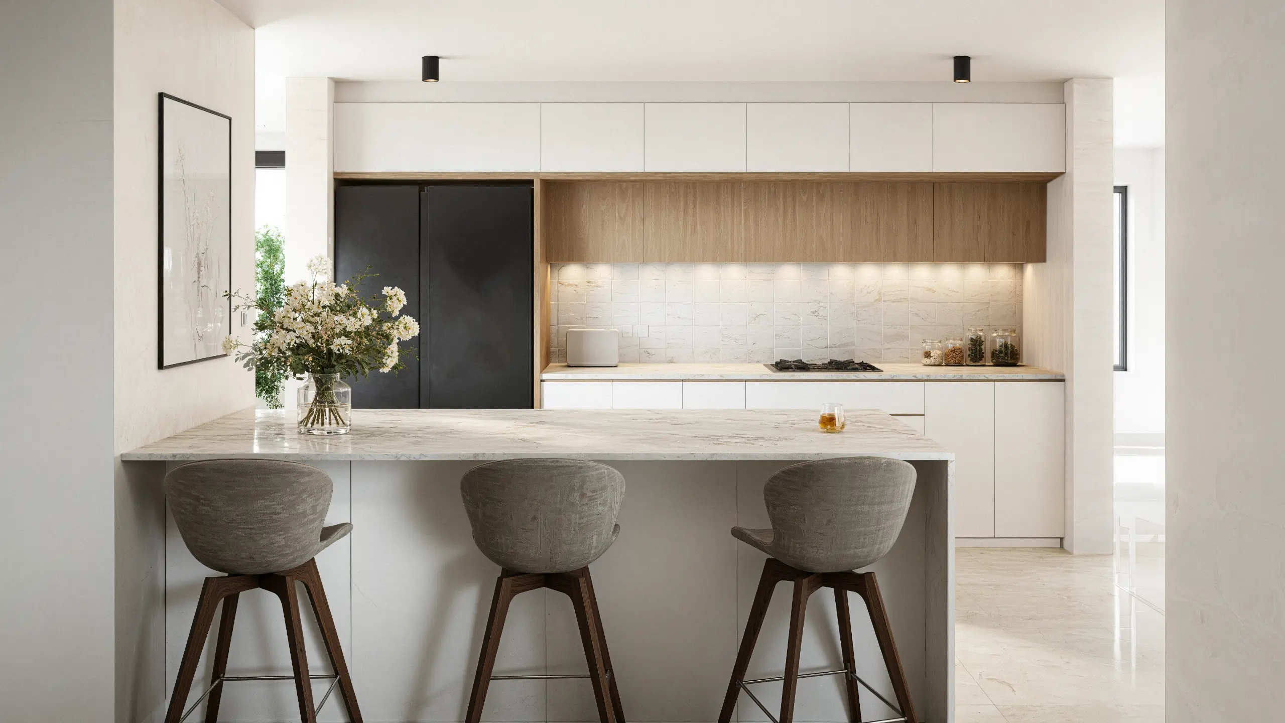 Modern kitchen with white sleek cabinets, wooden doors, and an island with chairs.