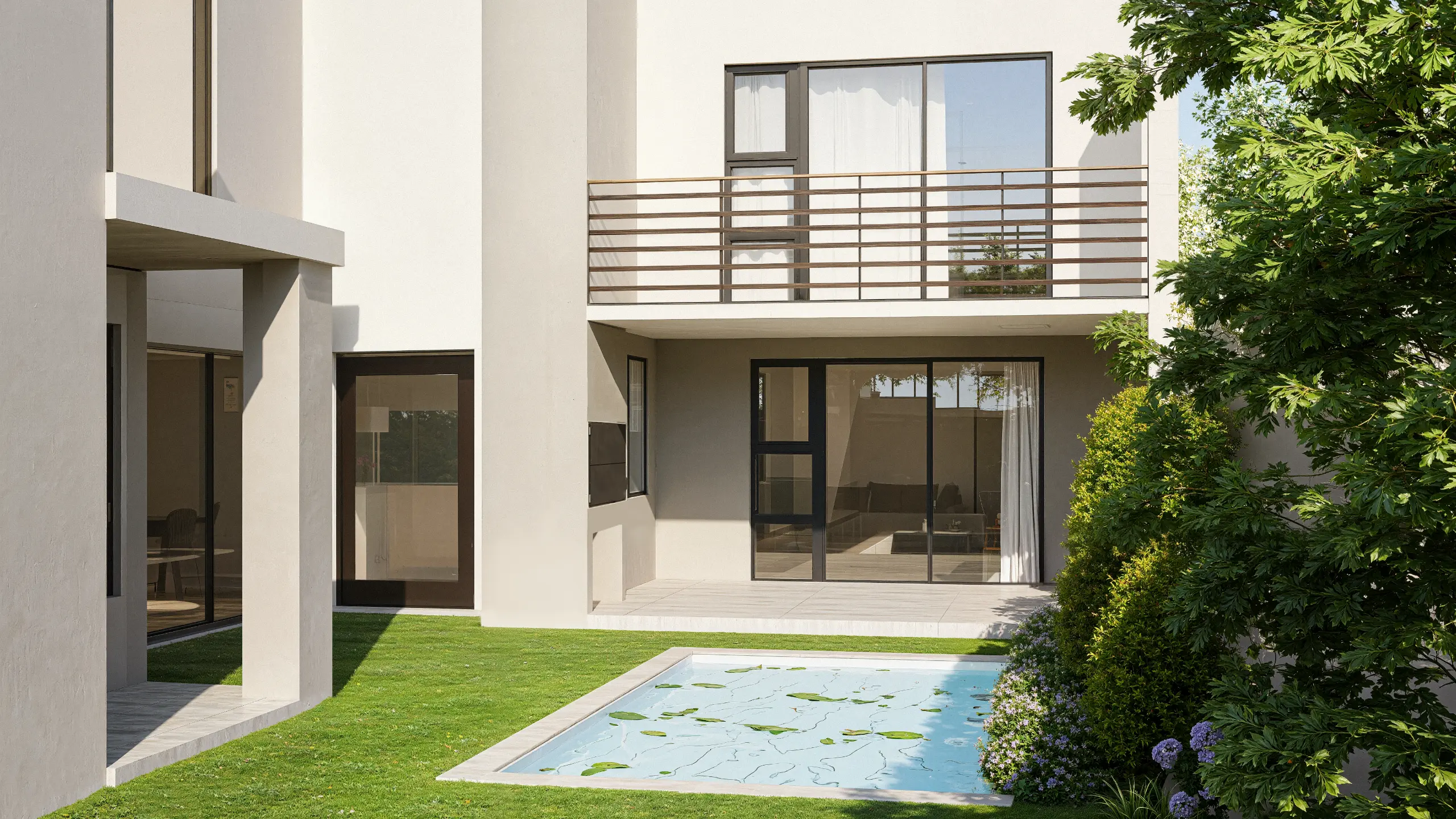 Garden area with a big pool and with a modern double storey l-shaped home around it.