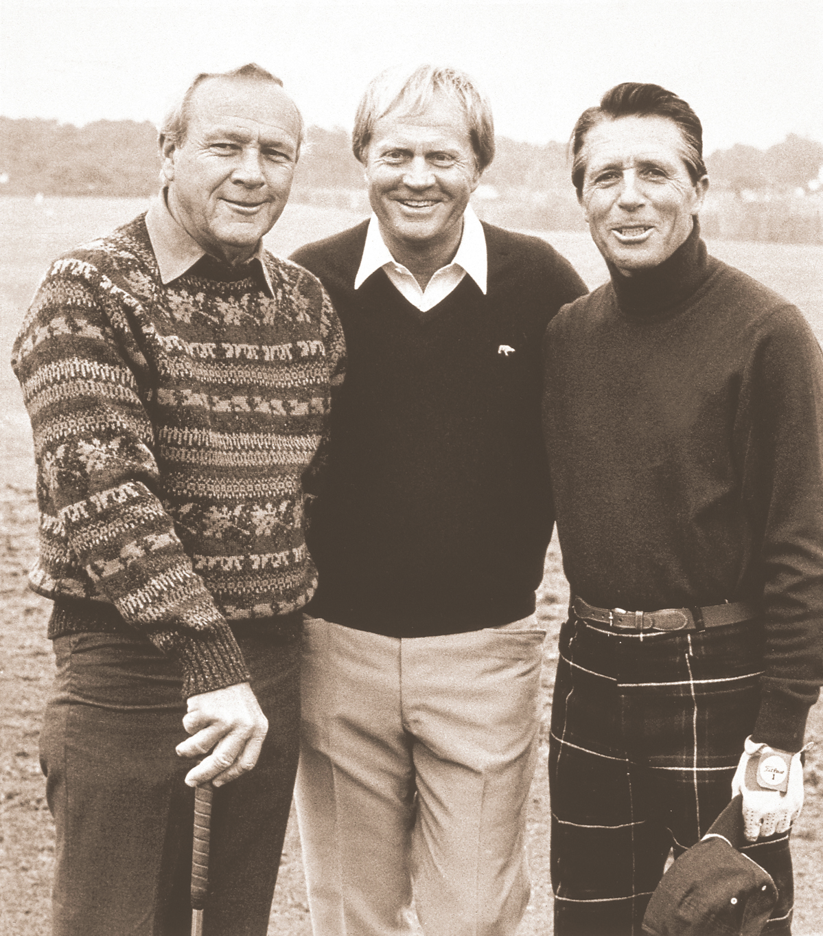 Three golfers in sepia