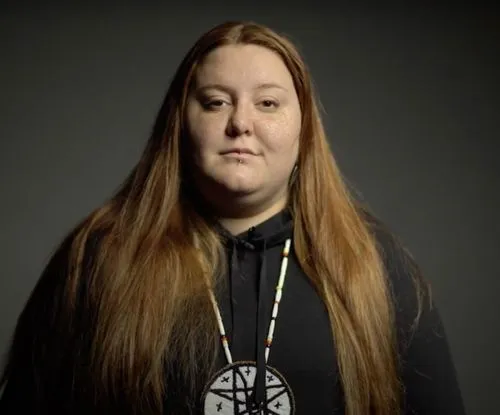 Young person looking directly at camera
