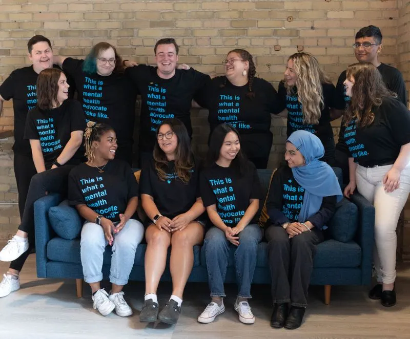 Young people sitting together in group wearing Jack.org shirts