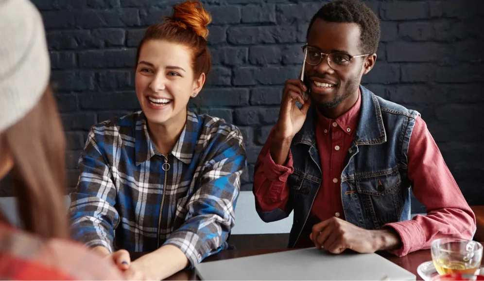 Two young people smiling