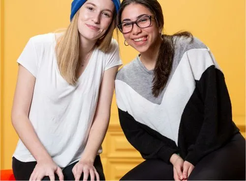Be There - Two young people leaning against each other