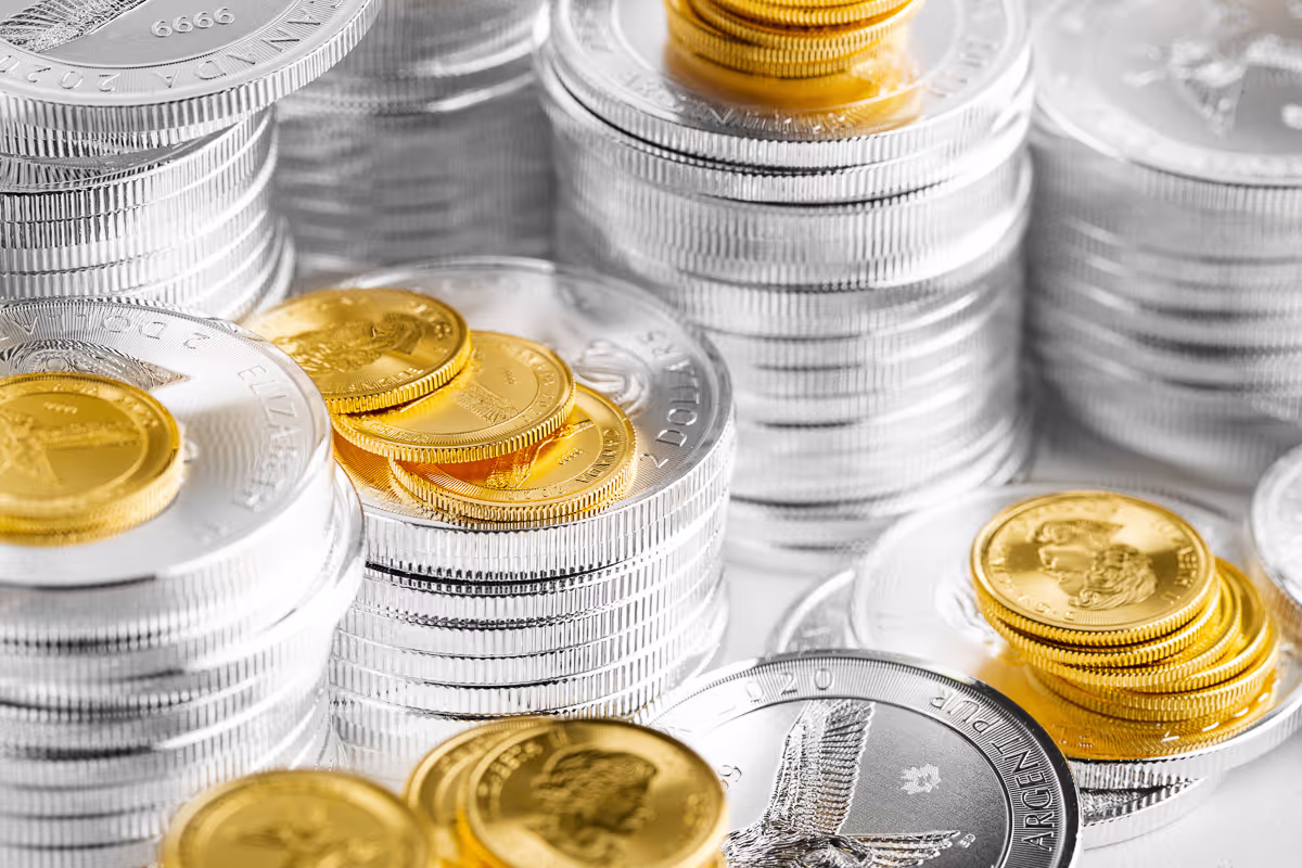 Silver and gold coins image stacked