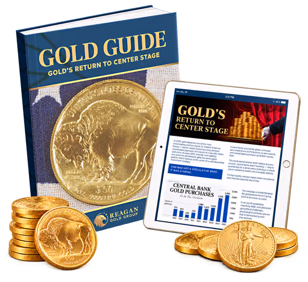 Gold guide and ipad together surround by coins
