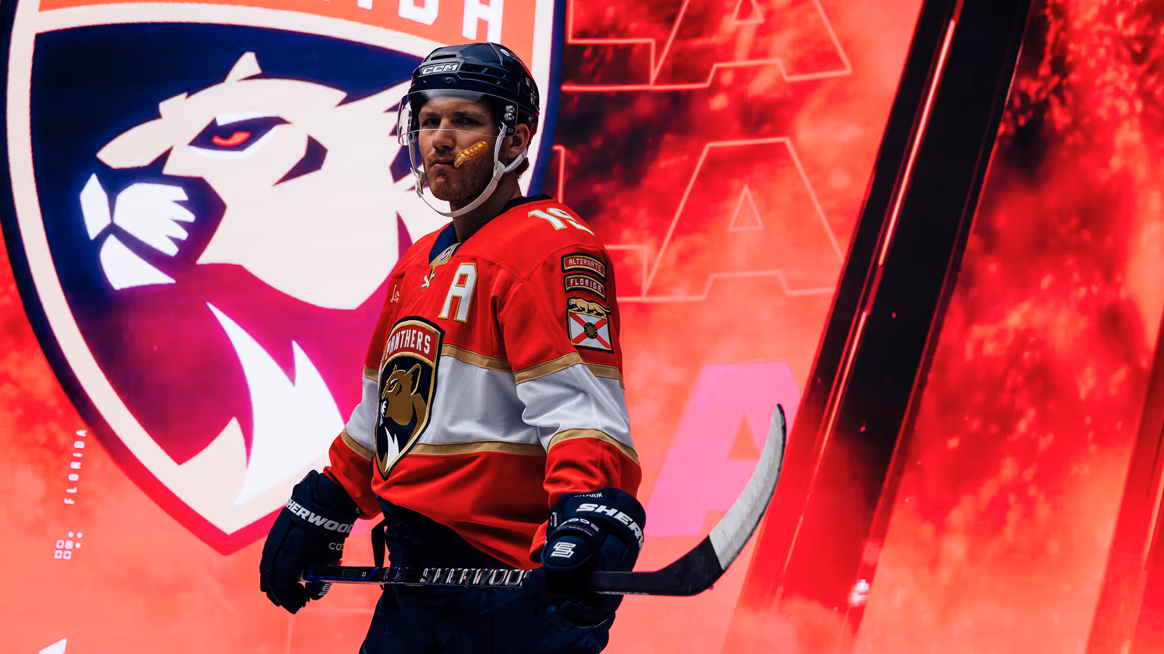 EA Sports NHL 26 campaign — hockey player in Florida Panthers jersey on ice