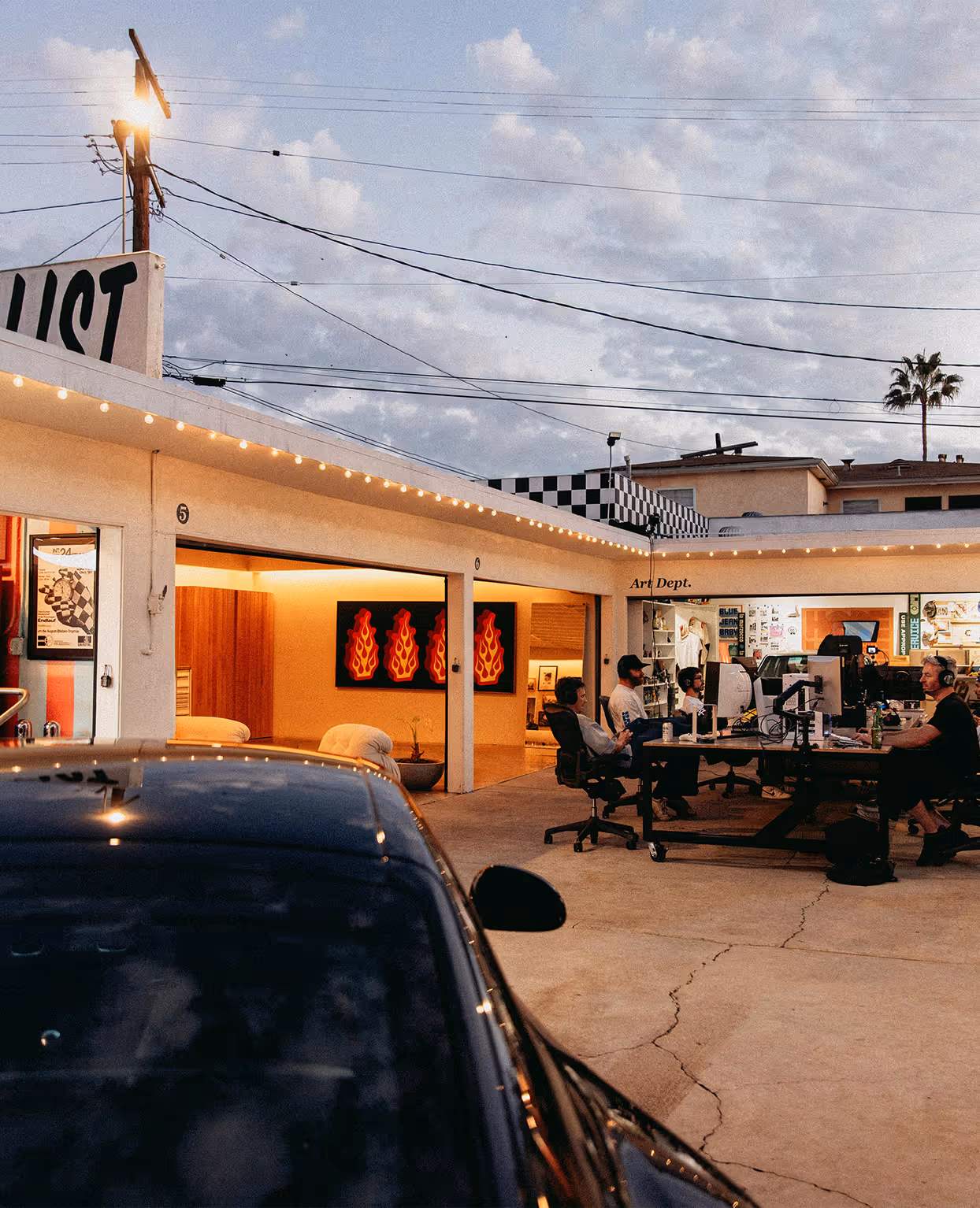 Milhouse Studio building exterior at dusk during the Battlefield 6 launch LAN party