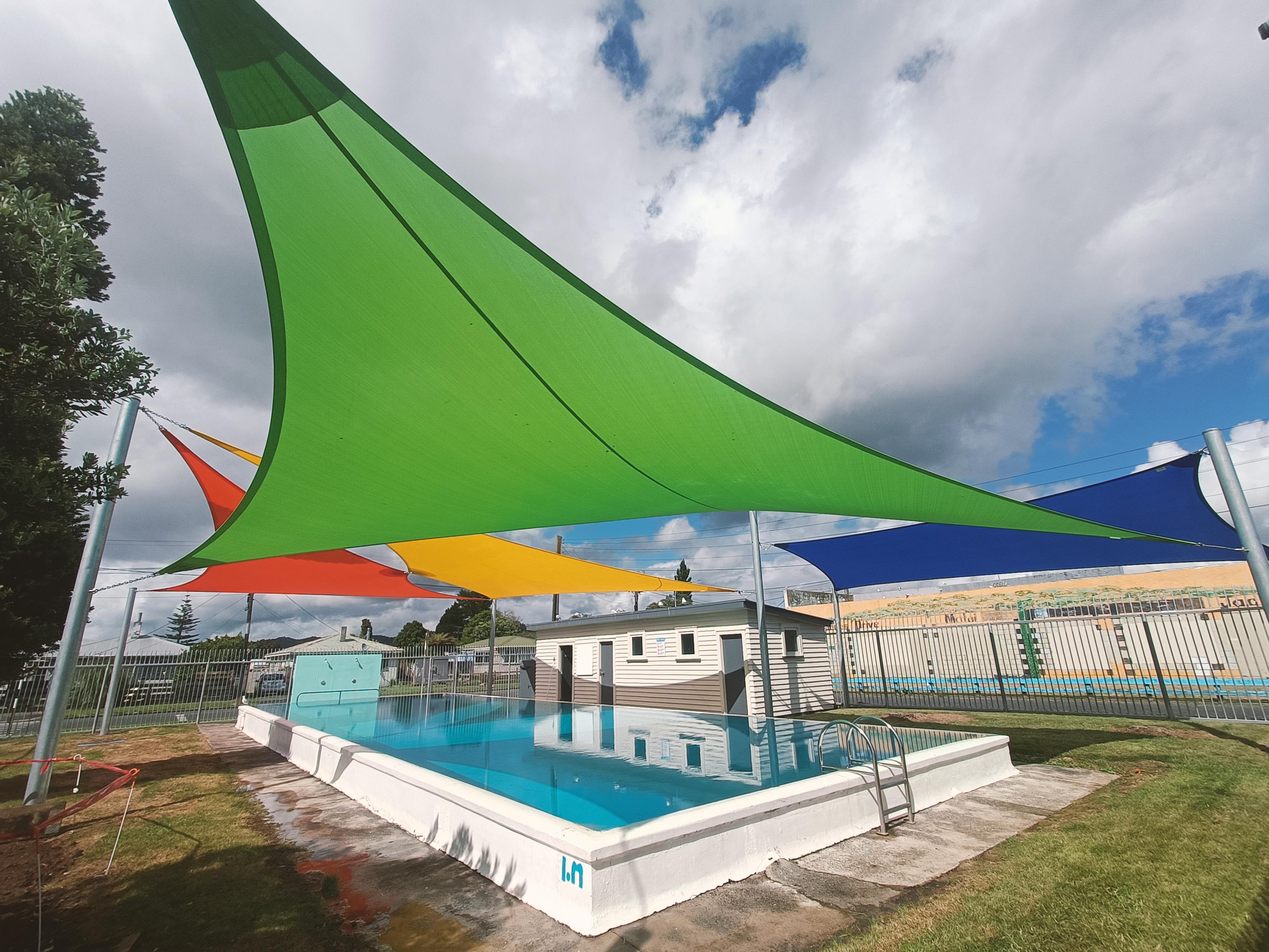 Shade sails over the pool at Otangarei School, Whangarei, installed by Shadeland