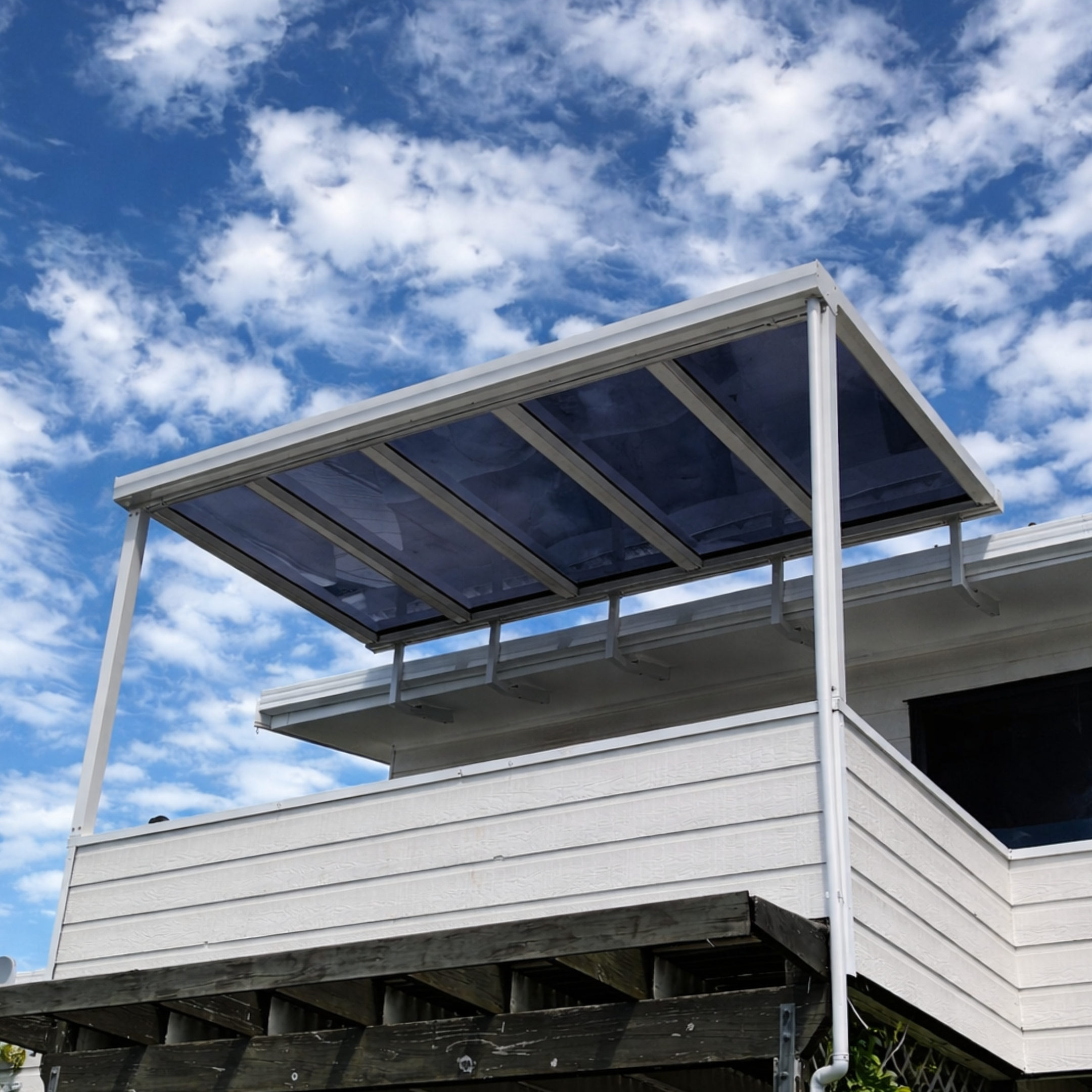 Clear, tinted and opal polycarbonate pergola roof panels compared, by Shadeland