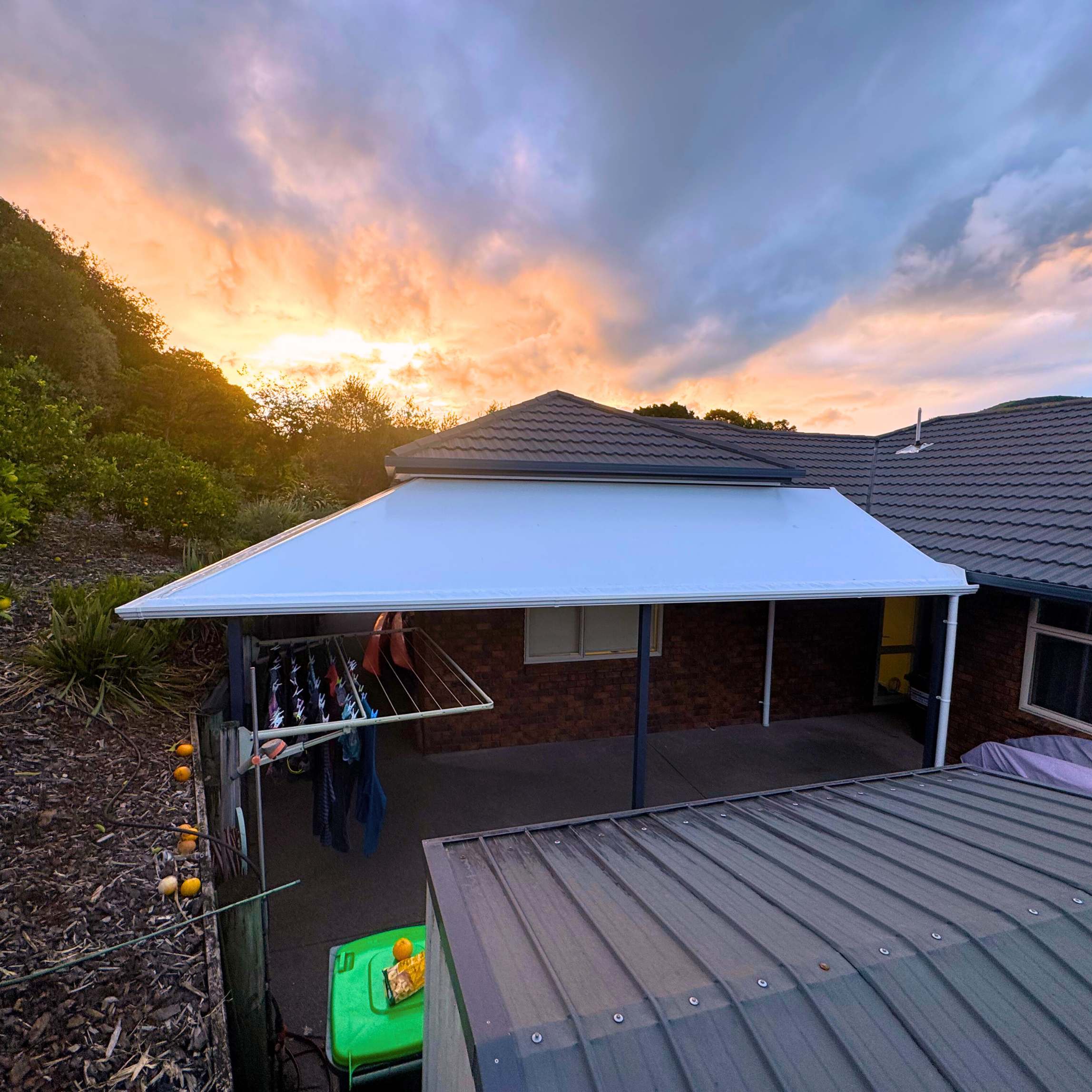 Custom tension canopy over a walkway and kayak storage in Kamo, Whangarei, by Shadeland