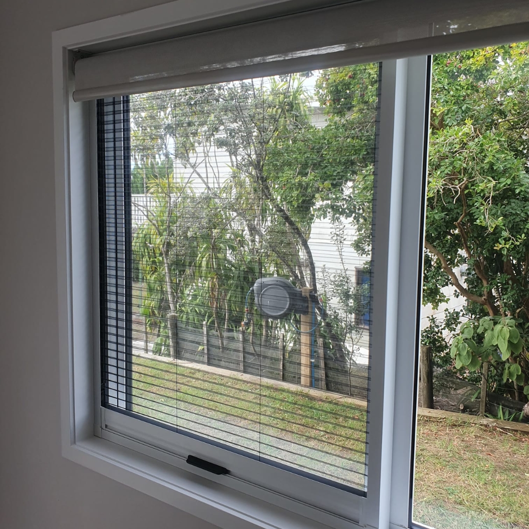 Retractable insect screens on a holiday home in Coopers Beach, installed by Shadeland