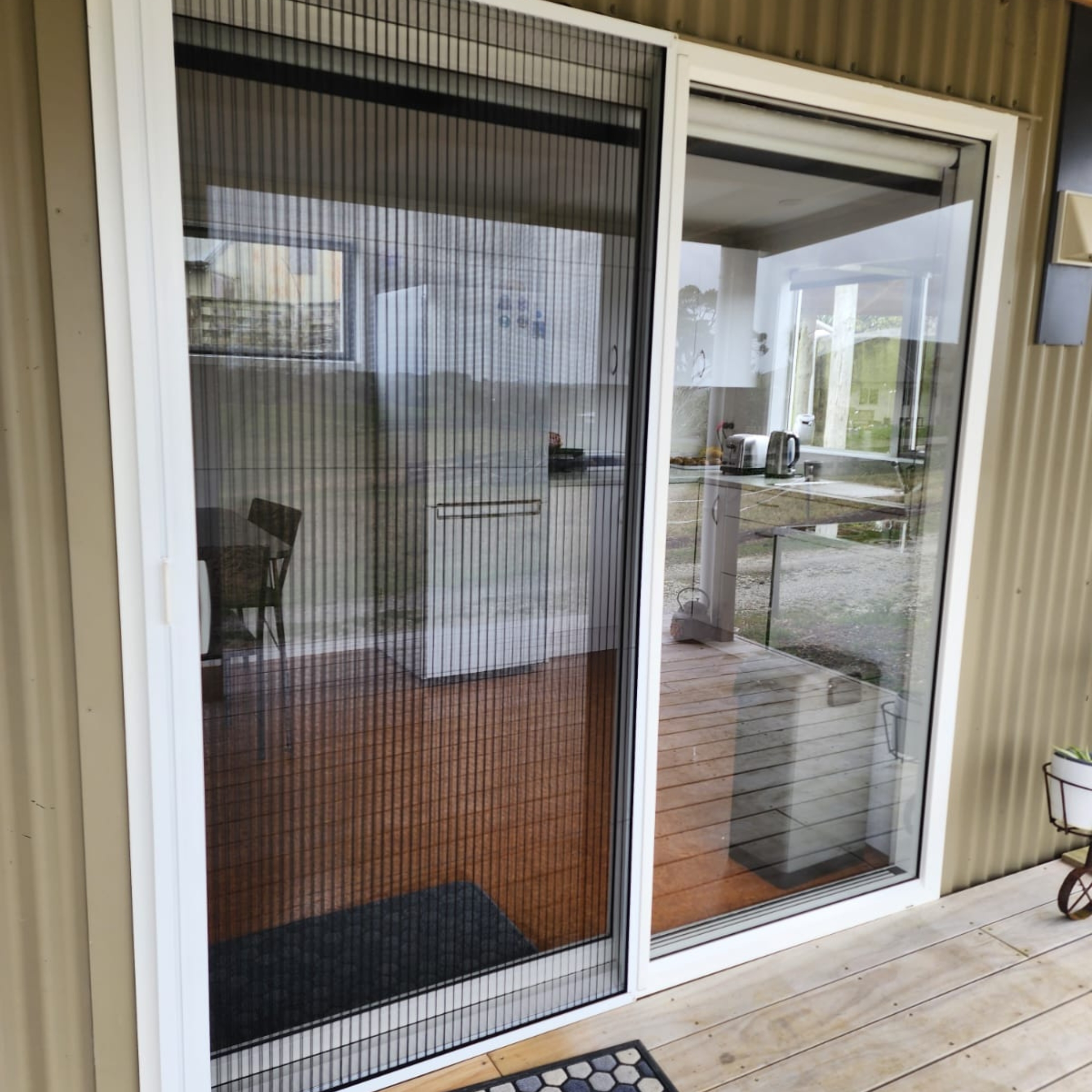 Detachable pleated insect screen on a farm building in Kaiwaka, by Shadeland