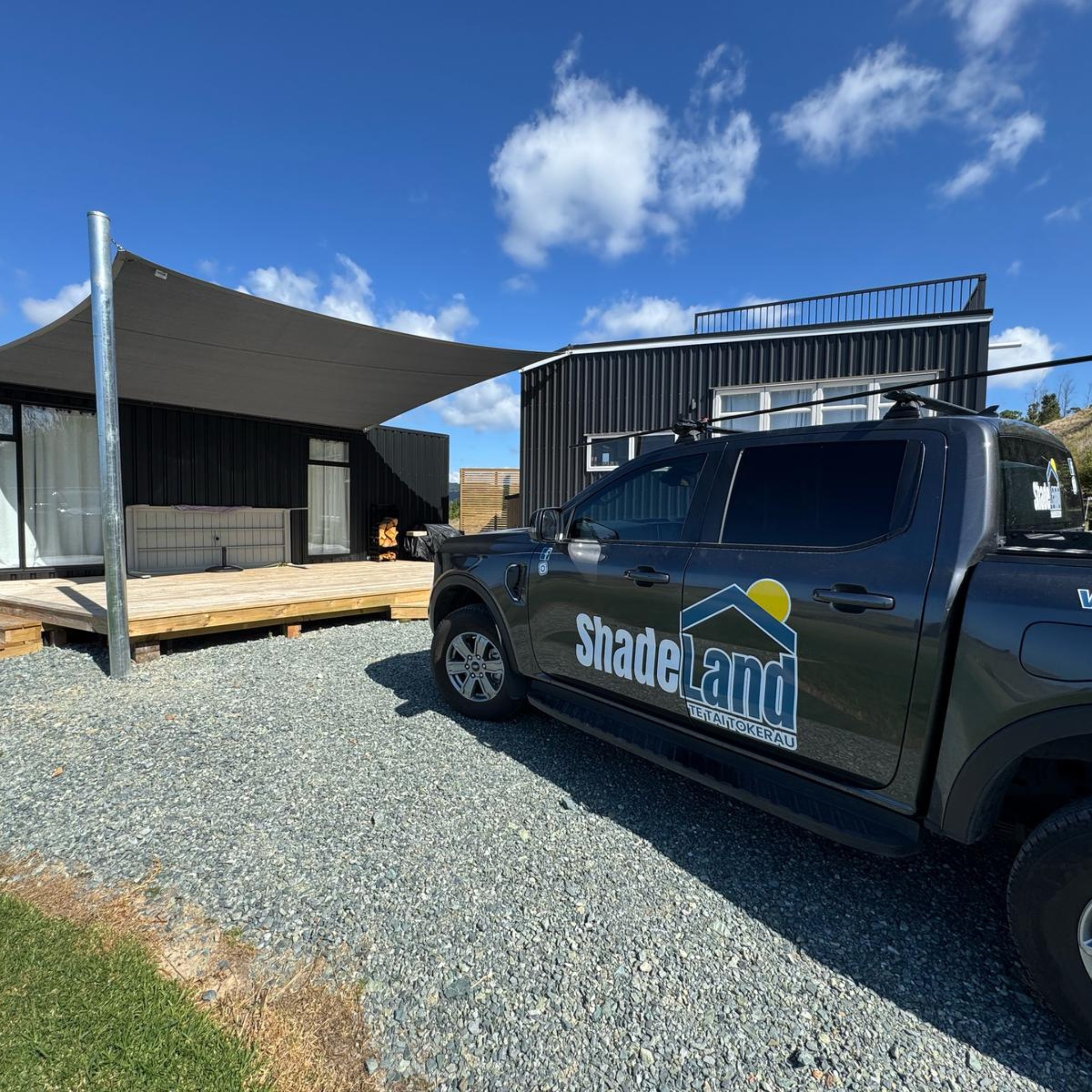 Shade sail preserving ocean views in Waipu, Northland, installed by Shadeland