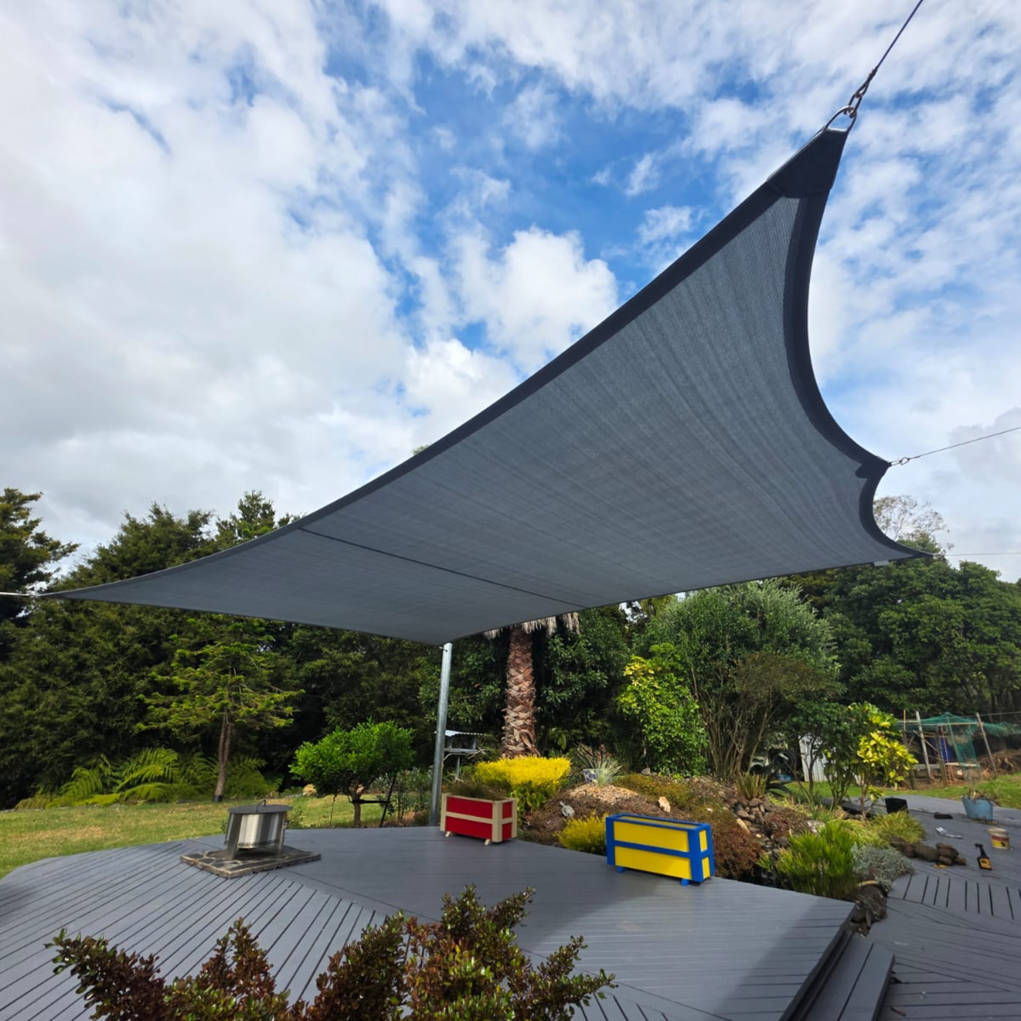 Custom shade sail over a deck in Dargaville, installed by Shadeland