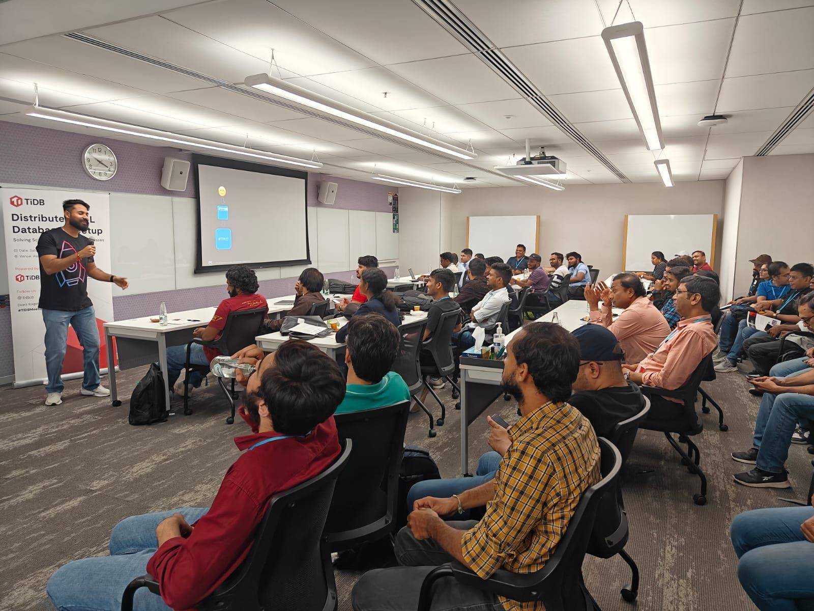Shubham Londhe from AWS giving a live demo of agentic AI and Strands Agents at the Distributed SQL meetup.