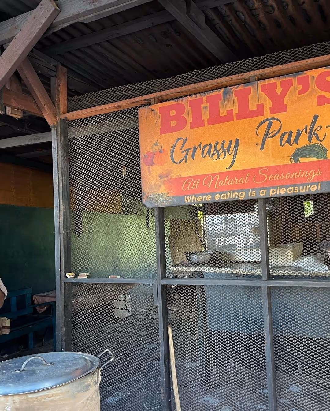 aeriel view of ocean with big rock mountain