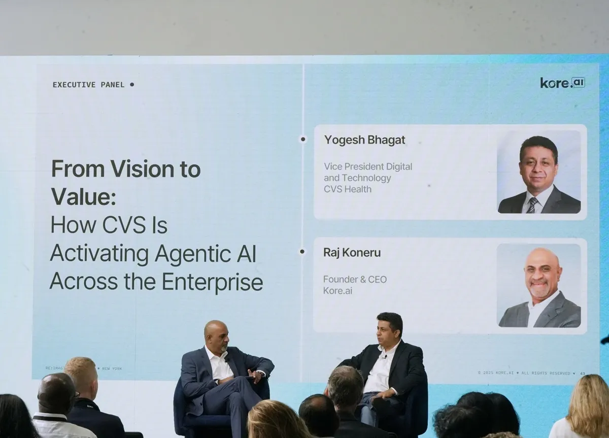 Executive Panel discussion slide titled "From Vision to Value: How CVS Is Activating Agentic AI Across the Enterprise," featuring Raj Koneru (Kore.ai) and Yogesh Bhagat (CVS Health).
