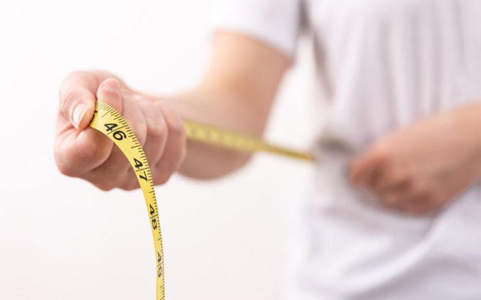 Measuring tape around waist
