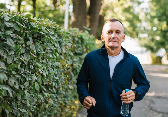 Aging man running