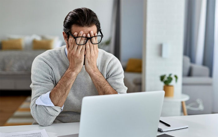 Man feeling exhausted