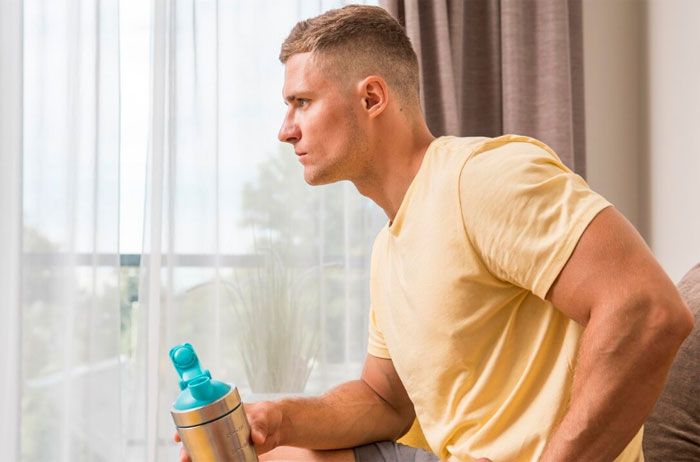Man holding a water bottle