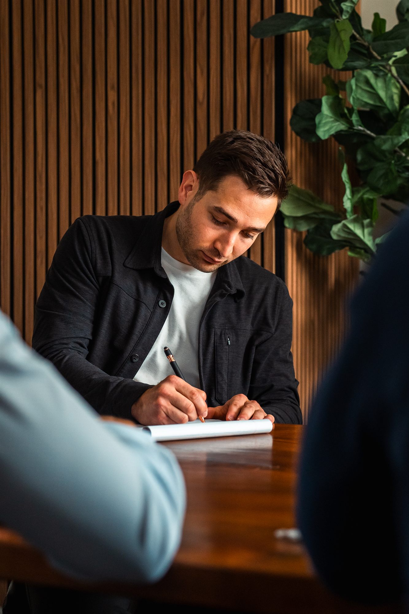 AFC team member taking handwritten notes