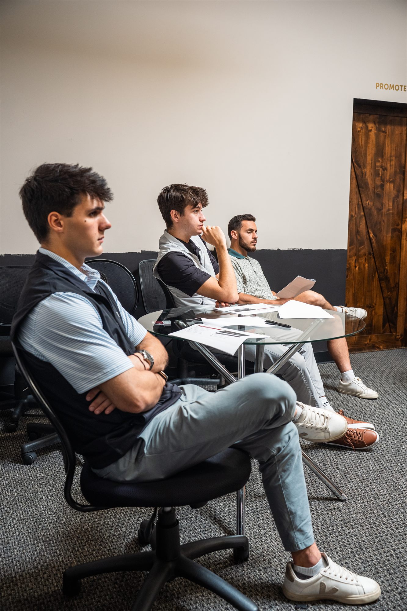 AFC team listening during a training session
