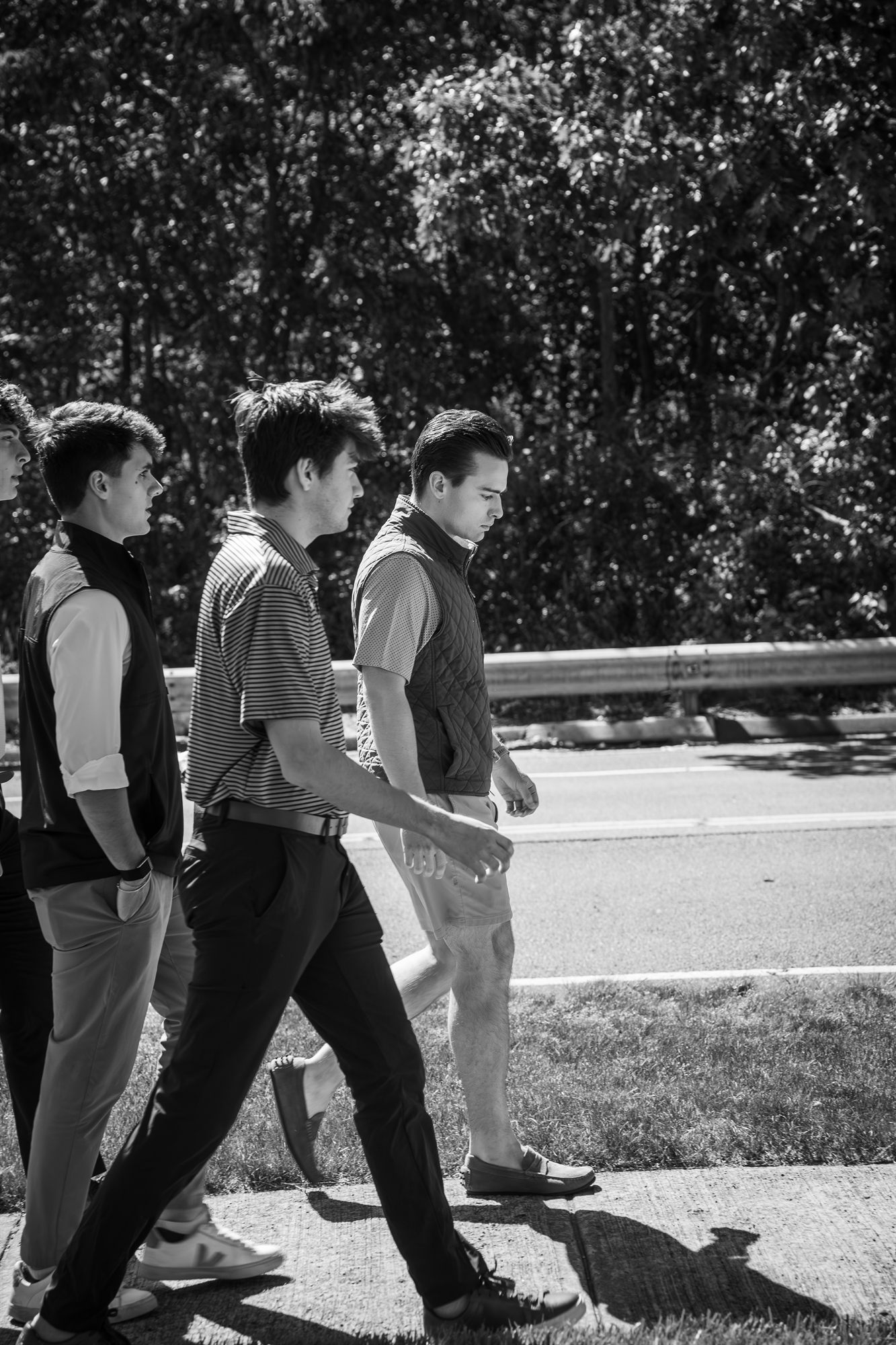 AFC interns walking with Gaetano on a sunny day