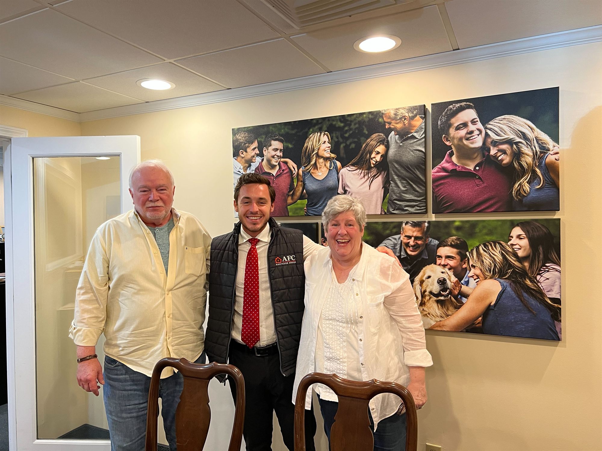 Joe and Martha smiling in the AFC office on closing day