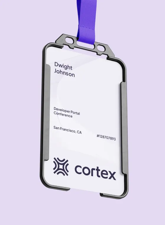 Conference badge with a purple lanyard displaying the name Dwight Johnson, event title Developer Portal Conference, location San Francisco, CA, ID #128707893, and the Cortex logo.